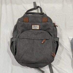 Revelino Classic Gray Canvas Backpack with Brown Accents